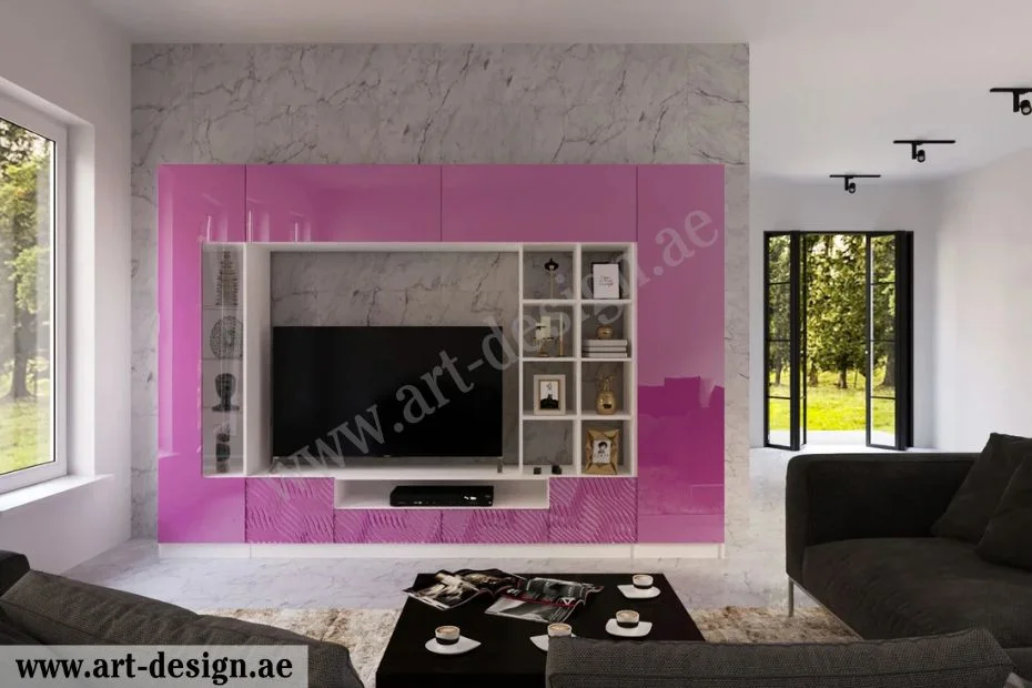 تصاميم ديكور صالات جلوس مع التلفاز في الامارات 9 طلاء الجدار بلون قوي يزيد التركيز على الشاشة
